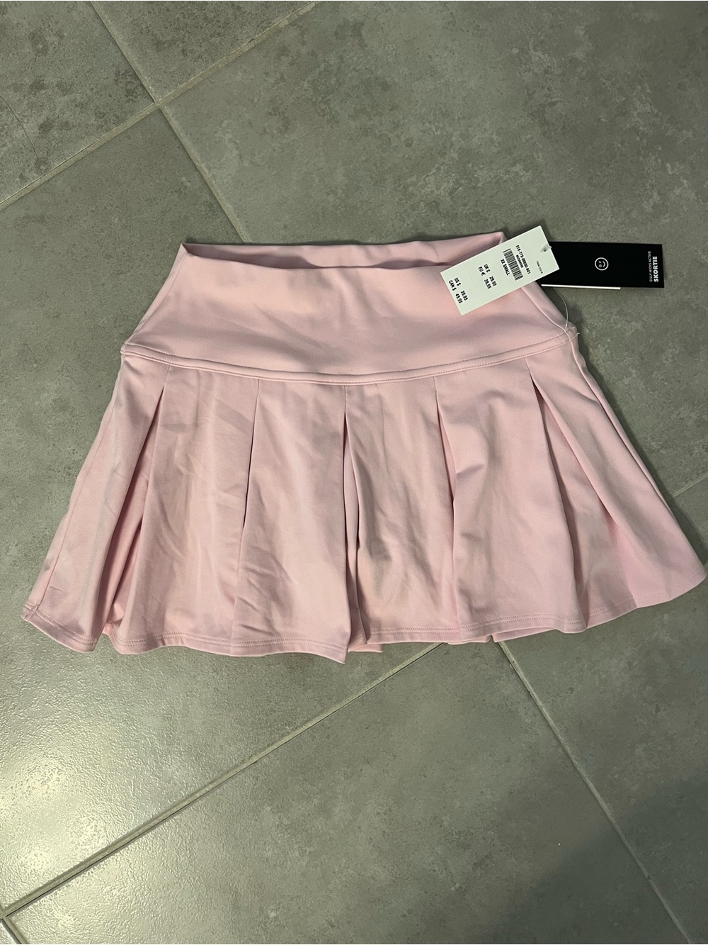 Gilly Hicks light pink pleated skirt with attached shorts. NWT. Size XXS.